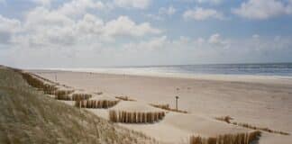 Zandsuppletie foto strand Texel